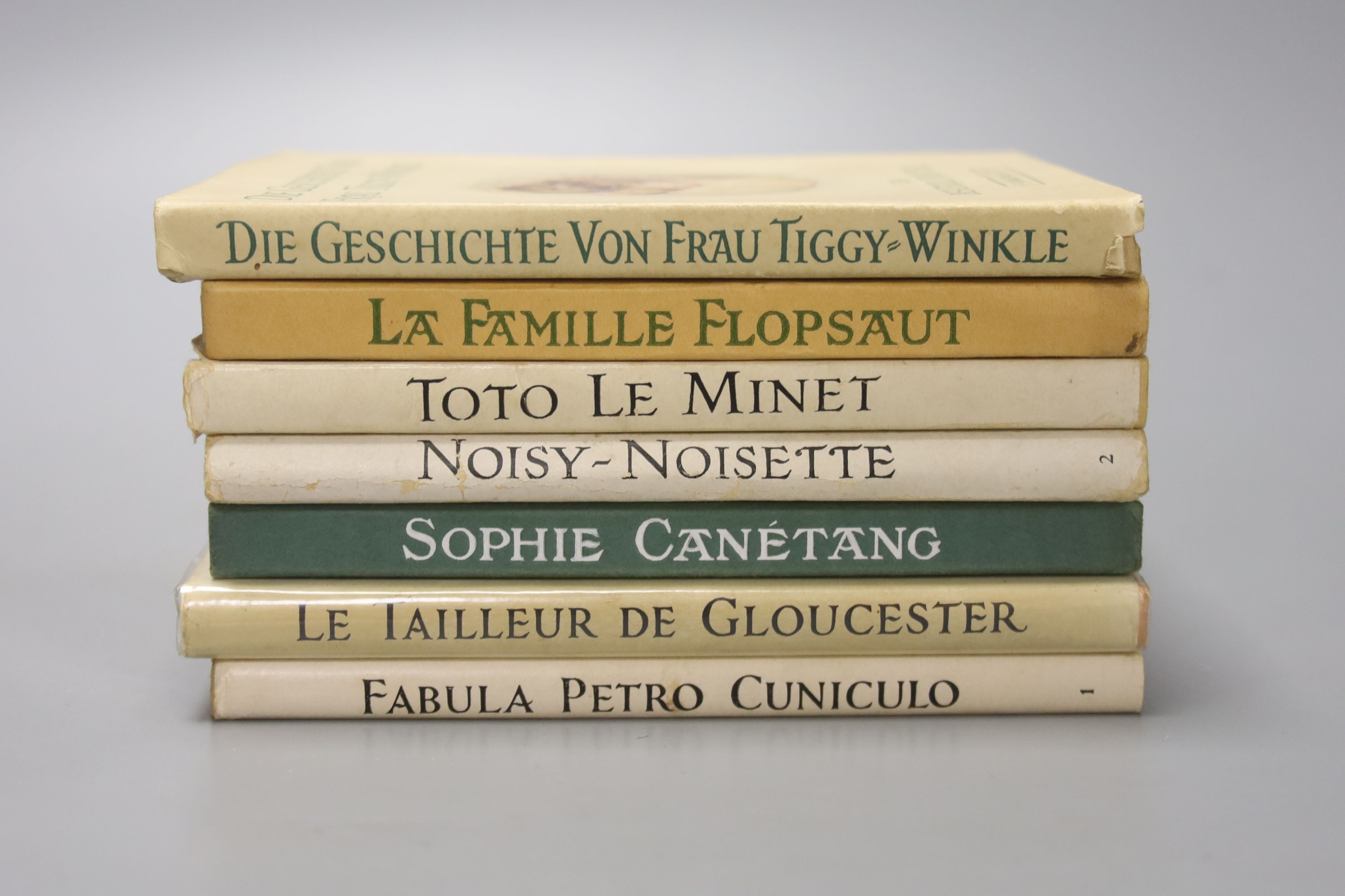 Potter, Beatrix, seven early foreign language editions, French 'La Famille Flopsaut', 'Sophie Canetang', Le Tailleur De Gloucester', 'Toto le Minet' and 'Noisy-Noisette together with German 'Die Geschichte Von Frau Tiggy
